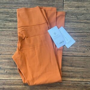 NWTs Athleta Transcend Leggings Burnt Orange